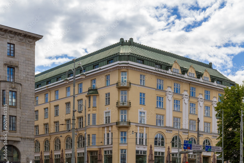 Obraz premium Art nouveau corner building with copper roof near Esplanade in Helsinki