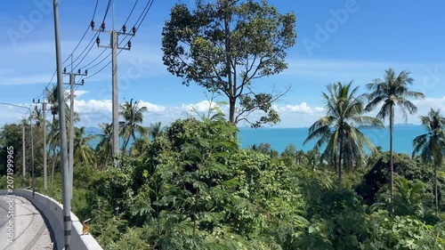 Transport traffic on road with seaview on background