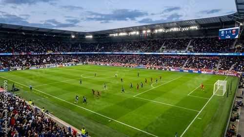 Photos Aerial drone view of a vibrant green professional soccer stadium field