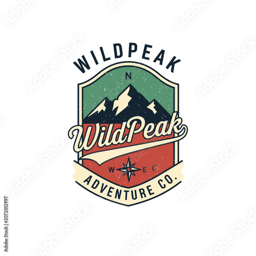 WildPeak Adventure shield logo with compass.