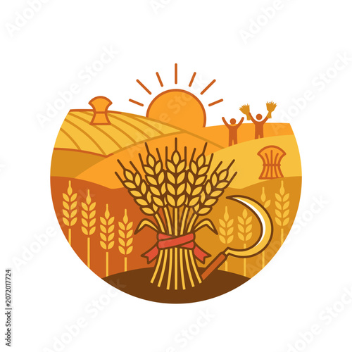 Wheat bundle and sickle in sunlit autumn farm field.