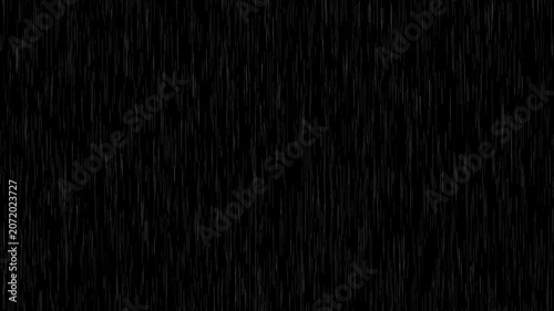 Heavy rain looping over black background.Falling raindrops footage animation in slow motion on black background.4K loopable high-speed footage.