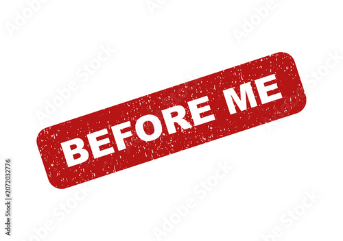 Red rubber stamp with the text before me in a distressed grunge style