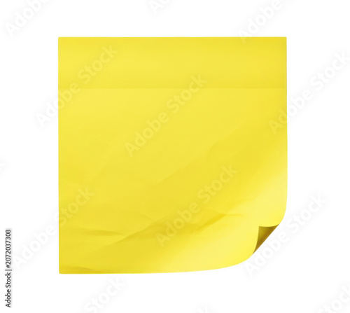 Bright yellow sticky note with curled corner on white background for business and planning