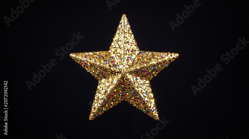golden star on black background