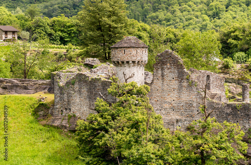 The ruins of Serravalle Castle, a historic medieval fortress located in the Blenio Valley in the Canton of Ticino, Switzerland.
