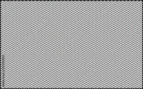 Industrial metallic herringbone pattern texture background featuring repeated gray geometric shapes in seamless tiling alignment