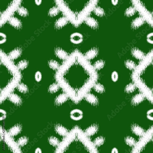 Seamless Ethnic Ikkat Pattern with White Tribal Motifs on Dark Green Background