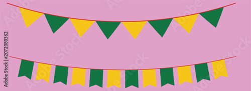 Festive green and yellow party bunting flags on a pink background