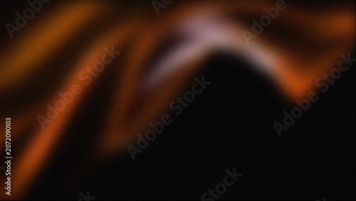 Fotografie Abstract orange light trails on black background, glowing amber motion blur wave