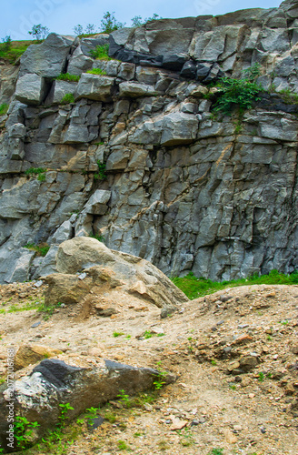Rocks and stones of Tarpania Lake, Marble Lake, Blue Dam, Patal Dam or Durga Bera,a scenic lake in the Ajodhya Hills of Purulia, West Bengal, India. Blue water surrounded by marble-like rocky cliffs.
