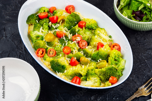 Vegetarian Broccoli Casserole with Melted Cheese and Cherry Tomatoes