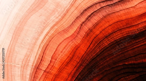 Close-up of Natural Grain Pattern with Rich Red and Brown Tones