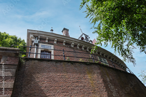 Oosterpoort (Eastern Gate) is the only surviving of once four city gates. Gate was built in 1578. In 1601 a house was built on top of the Oosterpoort. Hoorn, the Netherlands.
