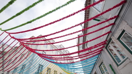 Colorful festive garlands decorating an european street