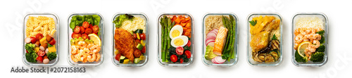 Canvastavla Weekly meal prep with seven homemade lunch boxes on a white background