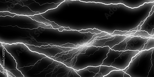 Massive lightning bolt with branches isolated on black bg. Mountainous Cumulus Clouds Boiling in the Summer Sky. Thunder, lightnings and rain on a stormy summer night in black and white. 