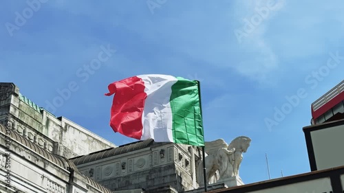 Italian Flag Waving Proudly Over Historic Milano Centrale