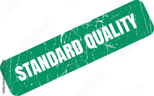 A distressed green rectangular stamp featuring the text standard quality in a bold sans serif font
