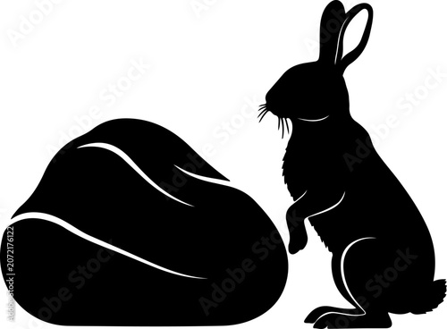 Silhouette of a Cute Rabbit Standing Beside a Large Stone in Minimalist Style
