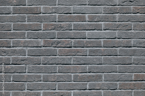 Dark gray brick wall texture as an urban architectural background
