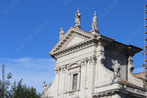 ROME, ITALY - JUNE 5, 2016: Roman Forum ruins and ancient stone structures under clear blue sky