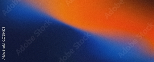 Vibrant abstract gradient featuring rich blue and orange tones with soft transitions and subtle grainy texture