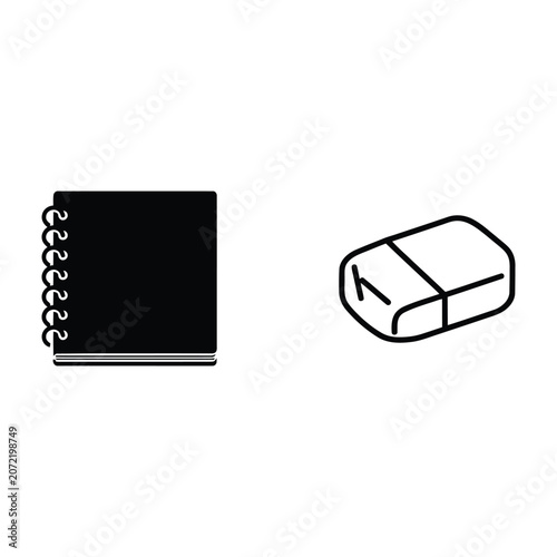 Fotografía Spiral bound notebook and eraser on white background