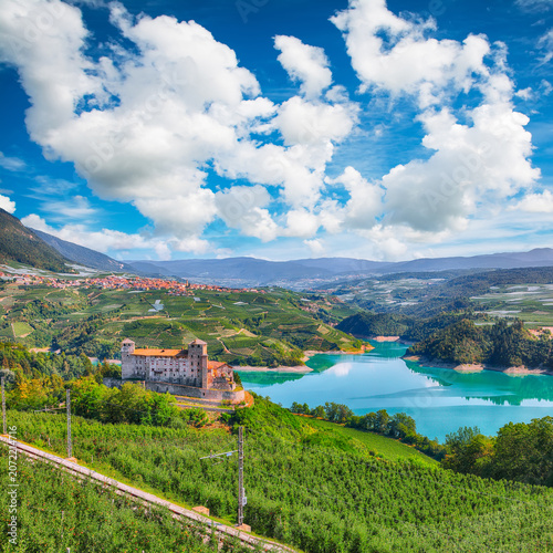 Gorgeous View of the Cles Castel, the Santa Giustina Lake and lots of apple plantations.