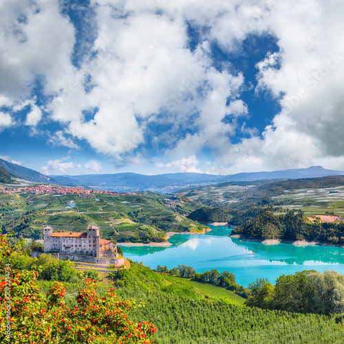 Gorgeous View of the Cles Castel, the Santa Giustina Lake and lots of apple plantations.
