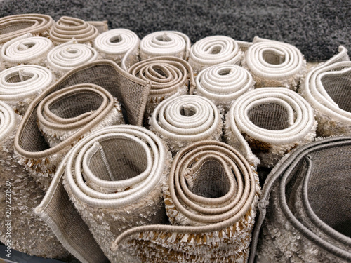 Valokuva Shaggy floor carpets in warm shades arranged in a megastore highlighting cozy an