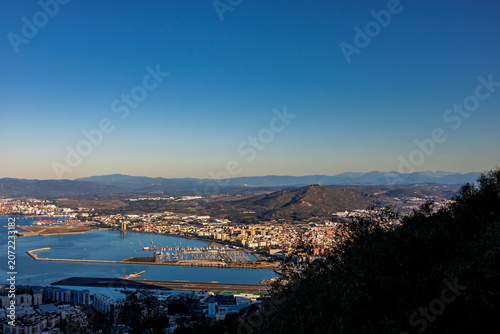 Scenic view of Gibraltar harbor from the Rock of Gibraltar. Port of Gibraltar.