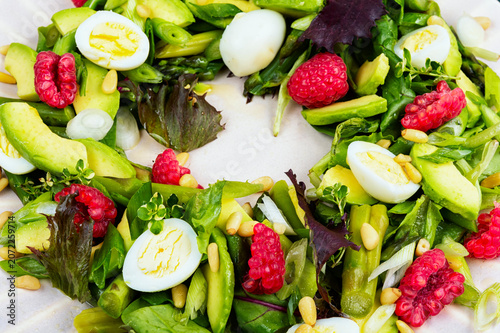 Healthy Asparagus and Avocado Salad with Quail Eggs and Fresh Raspberries