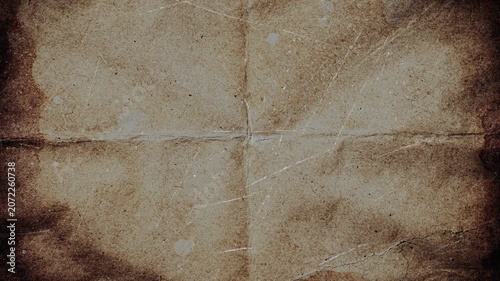 Abstract old vintage paper texture with dark vignette edges.