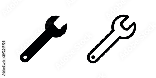 фотографія Classic spanner or wrench icon in solid and outline styles, a fundamental tool for various mechanical tasks