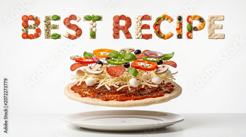 Levitating multi layered Pizza and BEST RECIPE text made of organic ingredients above a plate, conceptual food photography on white background