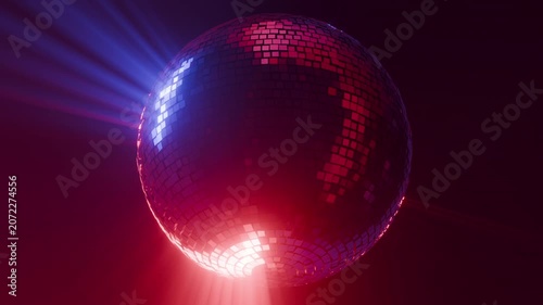Spinning colorful disco ball in fog intense rays 3d seamless loop animation