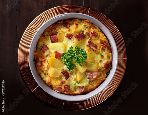 tartiflette in a bowl top down view
