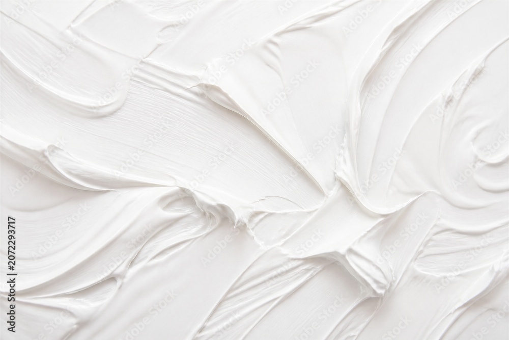 Naklejka premium White cream texture spread across smooth flat surface