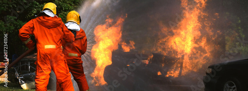 Obraz na plátne Banner Fireman wear hard hat, safety suit with copy space