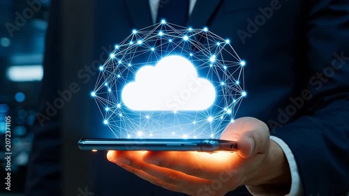 Man holding smartphone with cloud network graphic