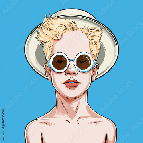 Young boy with albinism wearing sunglasses and hat outdoors