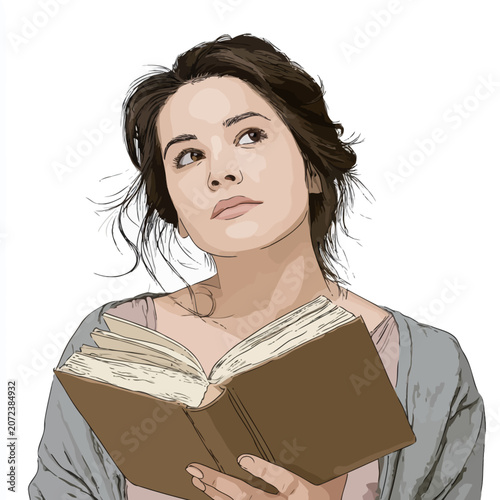 Young woman intently reading a book with deep concentration