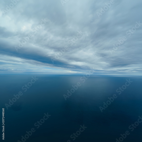 Dreamy Blue Sky and Ocean Horizon with Soft Cloud Motion