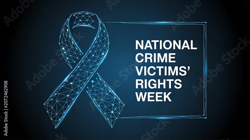 National crime victims rights week awareness ribbon on dark background