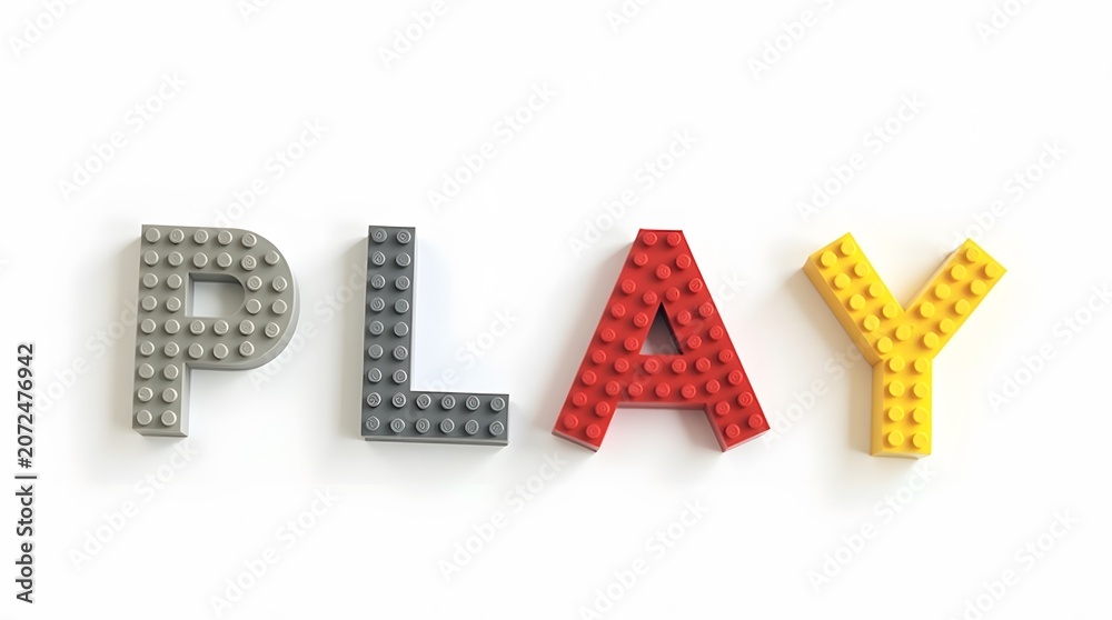 Naklejka premium Colorful building blocks create the word play on a bright white background