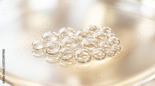 Serum Macro view of floating oil spheres, texture, essence, moisturizing, glowing, radiant