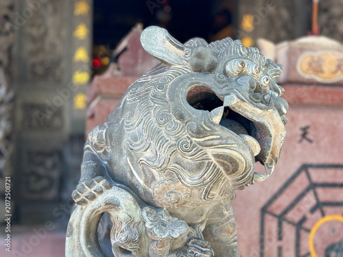 Lion sculpture in front of Fu De Zhen Shen temple in George Town on Penang Island, Malaysia