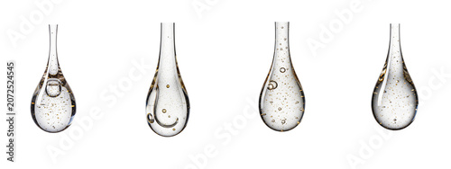 Four transparent gel serum drops with bubbles isolated on black background