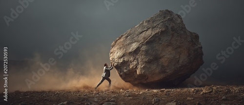 Person pushing a large rock symbolizes struggle.